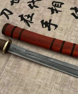 阿昌族月牙平头花纹钢刀素装